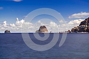 Roques de Salmor, volcanic rocks and cliff in Atlantic ocean photo