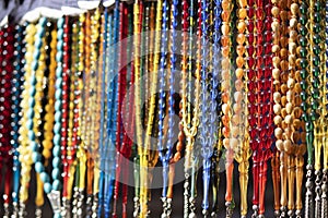 Rosaries in different colors and sizes that have fallen to the ground. It can be used for the requirements of Islamic