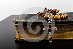 Rosary beads and prayer book photo