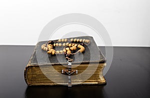 Rosary beads and prayer book photo