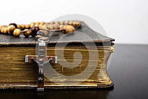 Rosary beads and prayer book photo