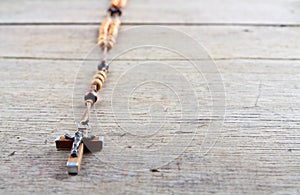 Rosary beads on the table photo