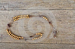 Rosary beads on the table photo