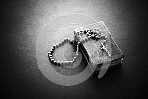 Rosary on the Bible