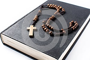 Rosary catholic cross on holyBible photo