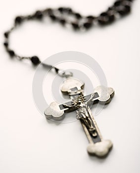 Rosary with crucifix.