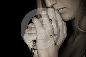 Rosary in hands photo