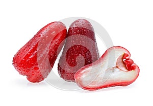 Rose apple with water drops on white background
