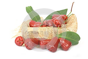 Rose apples on wooden crate