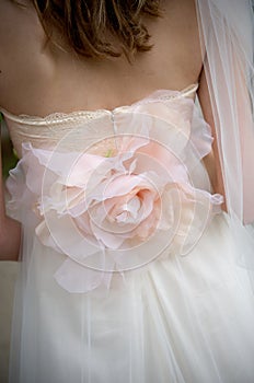 Rose applique on a bride's wedding gown