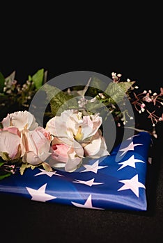 Rose bouquet and american flag on