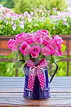 Rose bouquet enamel jug bow photo