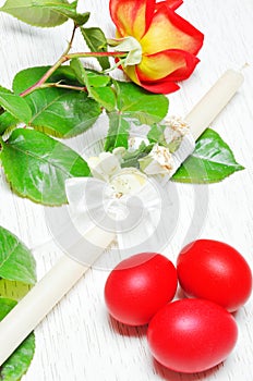 Rose ,Easter candle and red eggs