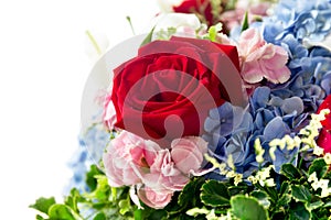 Rose in a floral bouquet blue hydrangeas and pink peony isolated