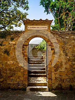 Rose garden entrance in San quirico d`orcia Tuscany Italy