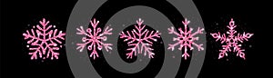 Rose Gold glitter texture snowflake hand drawn icons set on black background. Shiny Christmas, New year and winter