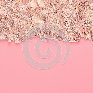 Rose gold paper torn edge border, pink abstract background, copy space.