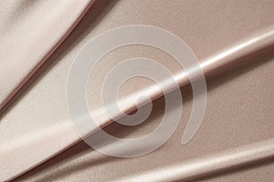 Rose gold silk fabric abstract background smooth and luxury texture