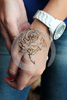 Rose on the hand