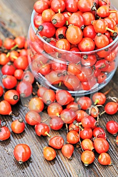 Rose hips in a glass jar