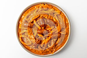 Rose noodle tteokbokki on white background