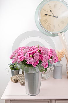 Rose peony Misty Bubbles. Bouquet flowers of pink roses in metal vase. Shabby chic home decor.