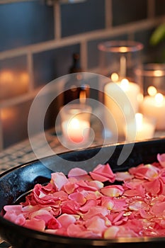 Rose-petal-filled Tub, Candles, and Aromatic Essential Oils