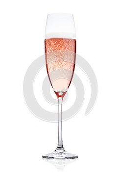 Rose pink champagne glass with bubbles isolated