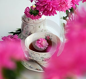 Rose tea, flowers, and dried petals