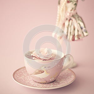 Rose on a vintage tea cup