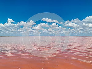 Rose water salt lake and blue sky with clouds of landscape
