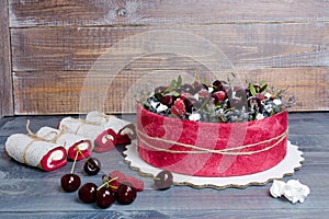 Rose wedding biscuit fruit cake with berries and some green