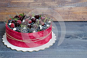 Rose wedding biscuit fruit cake with berries and some green