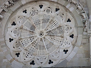 Rose window of the cathedral of Troia in Puglia in Italy.