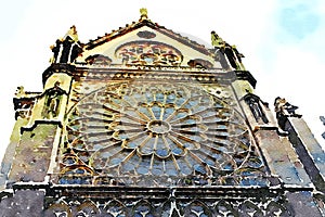 The rose window on a facade of the Notre dame cathedral in Paris in the autumn