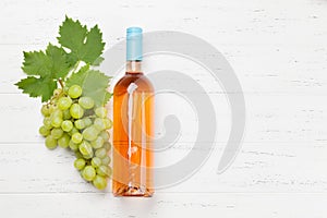 Rose wine bottle and grape