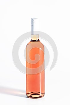 Rose wine bottle on the white table. Rosado, rosato or blush wine tasting in wineshop, bar concept. Copy Space