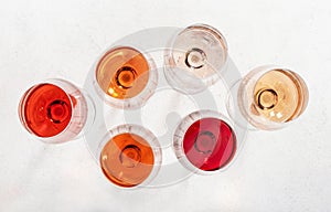 Rose wine glass on gray table. Pink rosado, rosato or blush wine tasting in wineshop, bar concept. Copy Space
