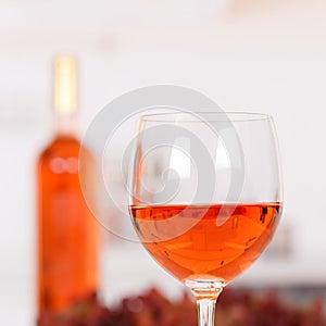 Rose wine in a glass square copyspace