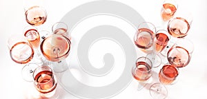 Rose wine glasses on wine tasting. Degustation different varieties of pink wine concept. White background, top view, hard light