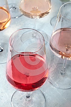 Rose wine of various shades at a tasting in a winery. Winetasting event photo