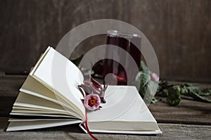 Roselle drink on Wood desk with a books note and repice