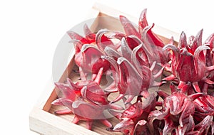 Roselle fruit in wood box isolated