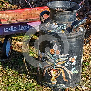 Rosemaling on an Antique Milk Can and Radio Flyer Wagon