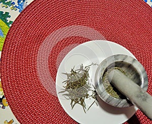 Rosemary Rosmarinus Being Ground in a Mortar & Pestle