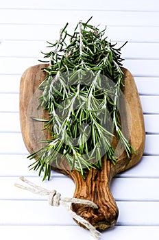 Rosemary on the wooden board