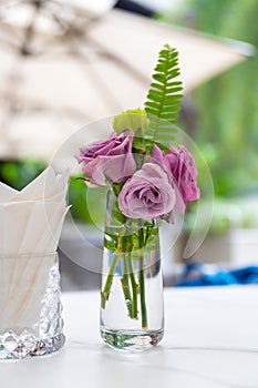 roses in glass vase