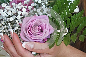 Roses in the hands. photo