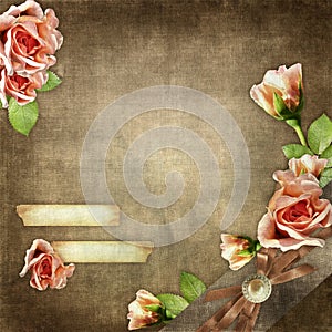 Roses and old paper on a brown grunge background