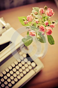 Roses and old type-writer photo